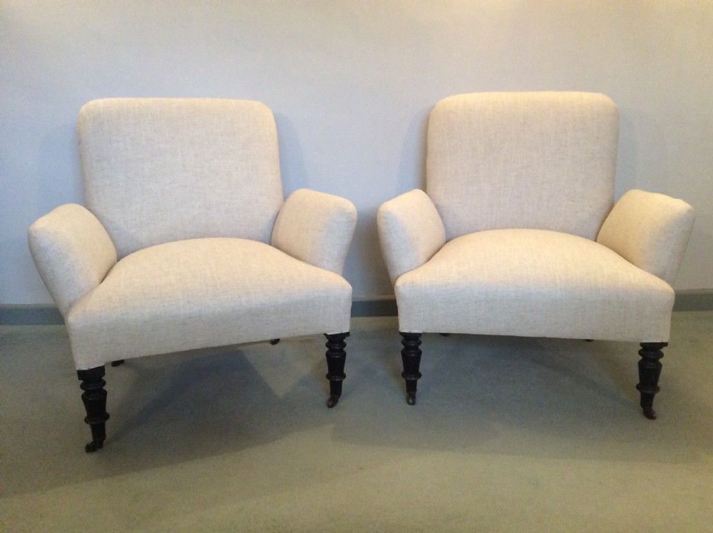 A PAIR of unusual French upholstered armchairs