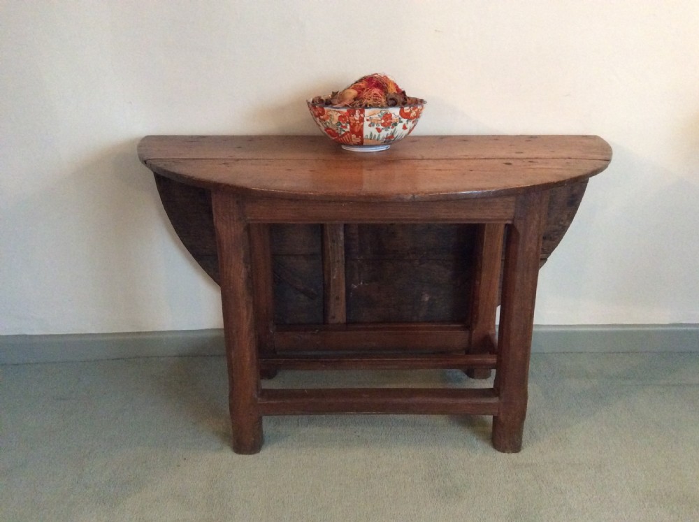 An 18thC French oak low occasional table View II