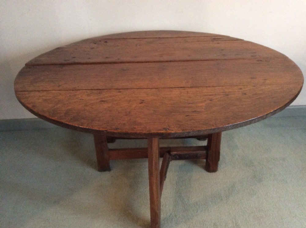 An 18thC French oak low occasional table View IV