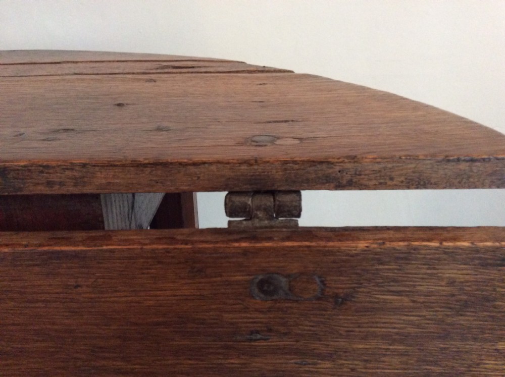 An 18thC French oak low occasional table View X