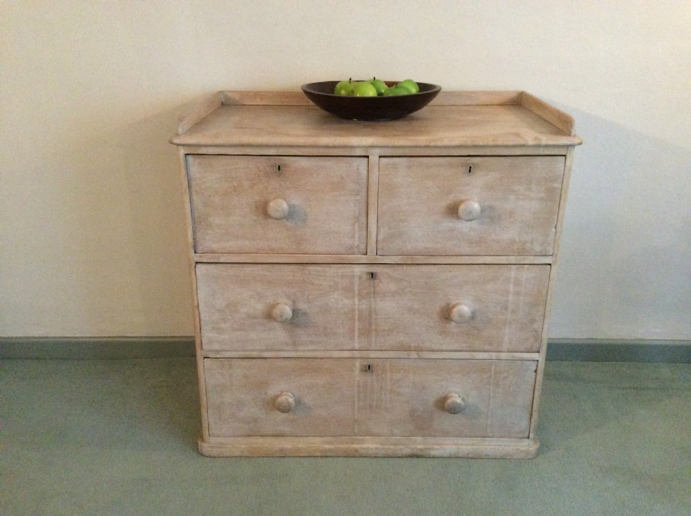 A lime waxed Victorian pine chest of drawers