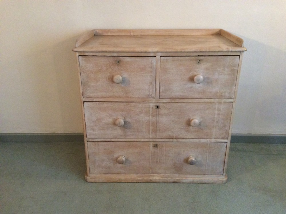 A lime waxed Victorian pine chest of drawers View II