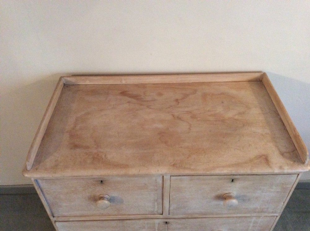 A lime waxed Victorian pine chest of drawers View VI