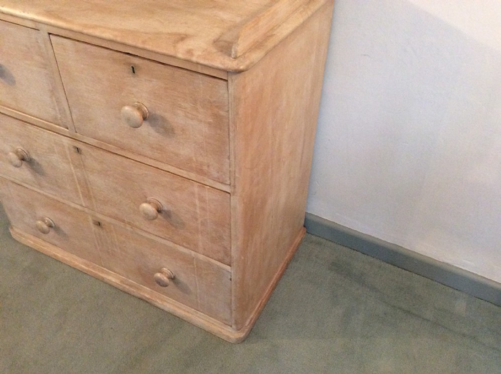 A lime waxed Victorian pine chest of drawers View VII