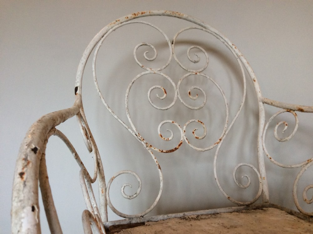 A pair of French iron garden chairs View IV