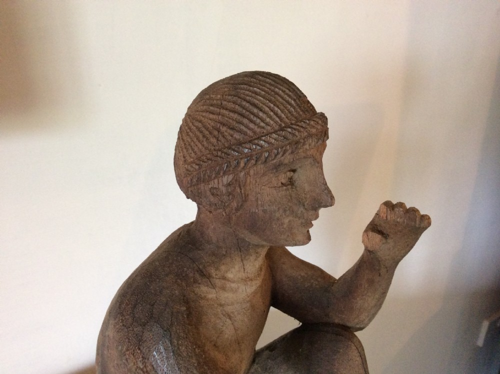 A carved wood Deco period sculpture View VII