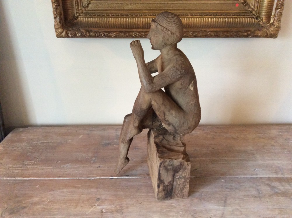 A carved wood Deco period sculpture View X