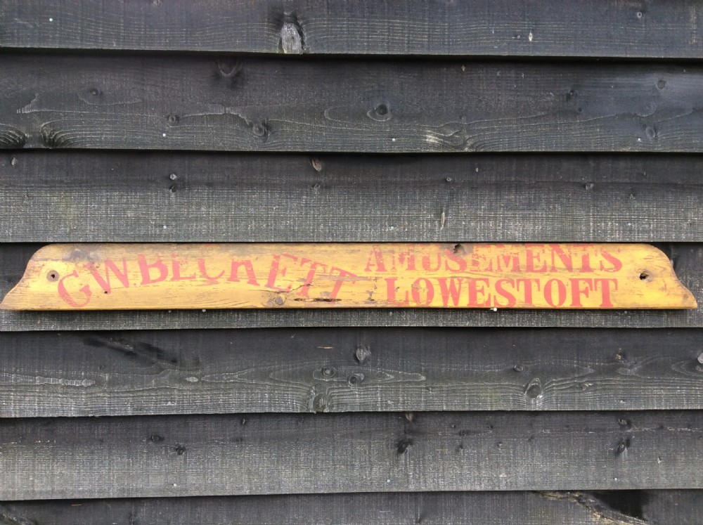 A GENUINE wooden fairground sign