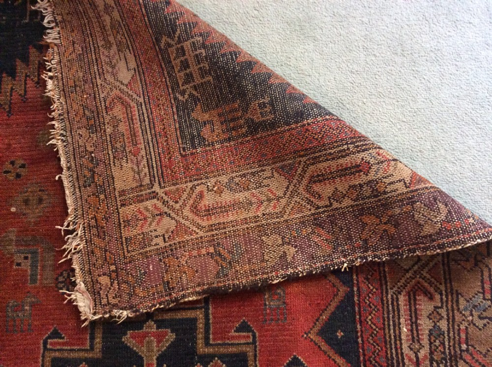 A 2m long handmade antique rug View IV