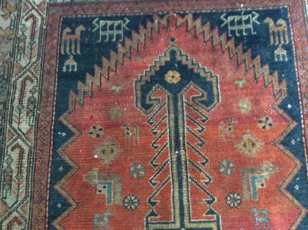 A 2m long handmade antique rug View VI