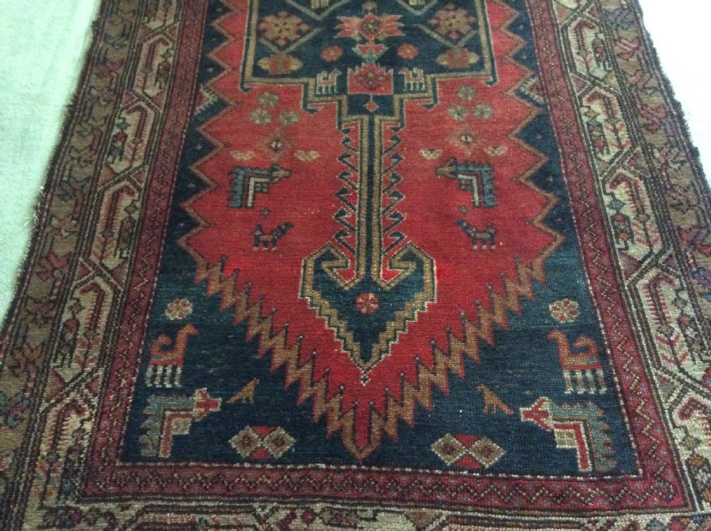 A 2m long handmade antique rug View VII