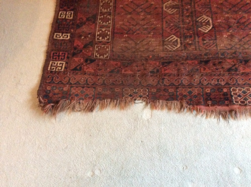 A 193cm x 145 cm antique rug View X