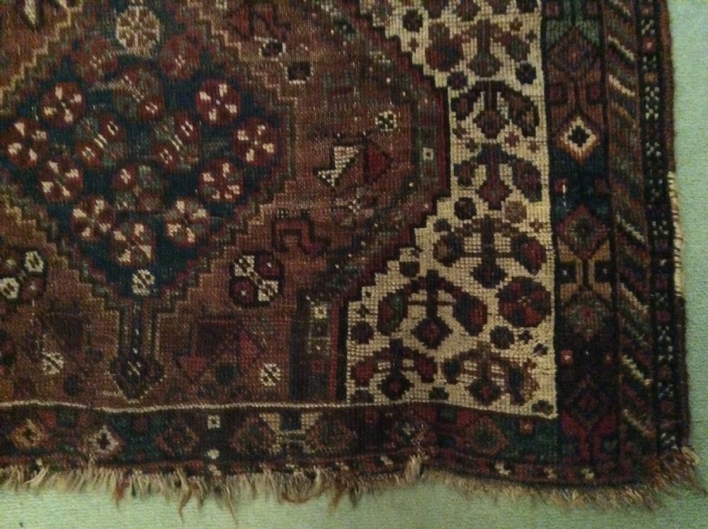 A small antique rug View II