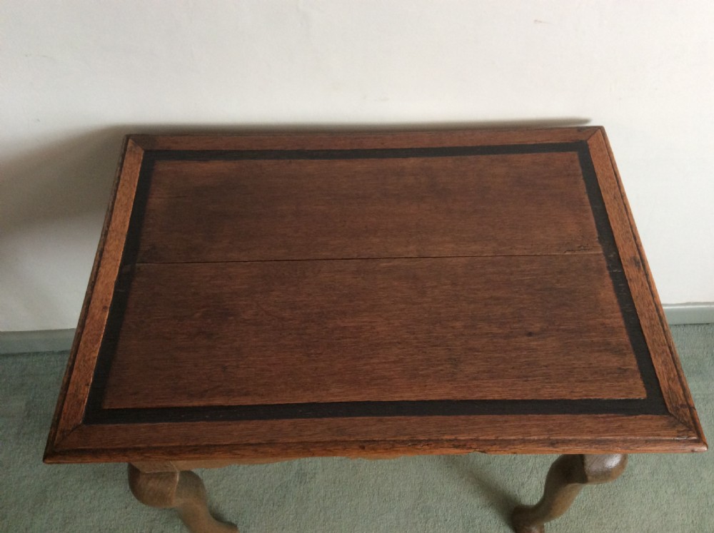 An 18thC oak hoof foot lowboy View III