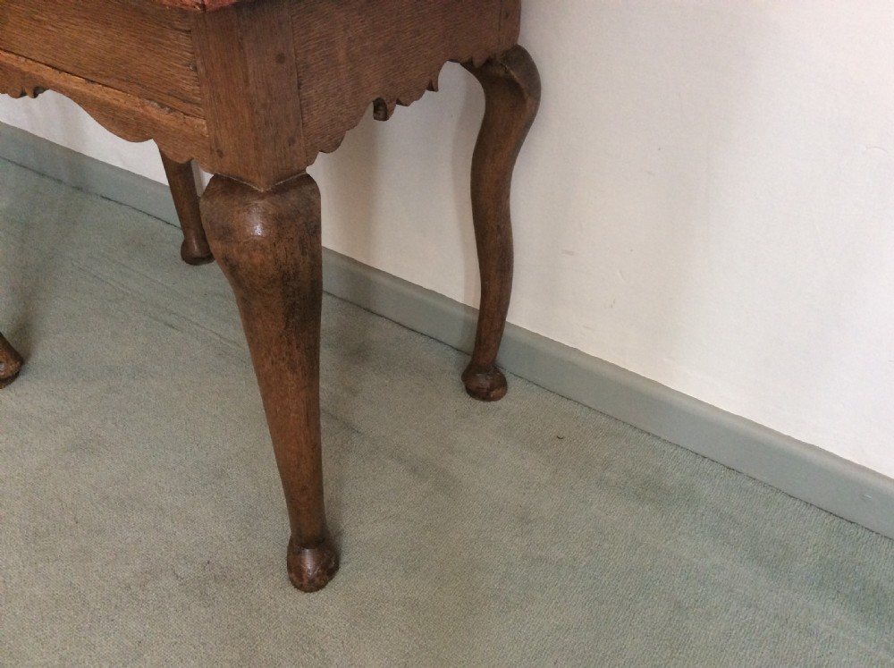 An 18thC oak hoof foot lowboy View IV