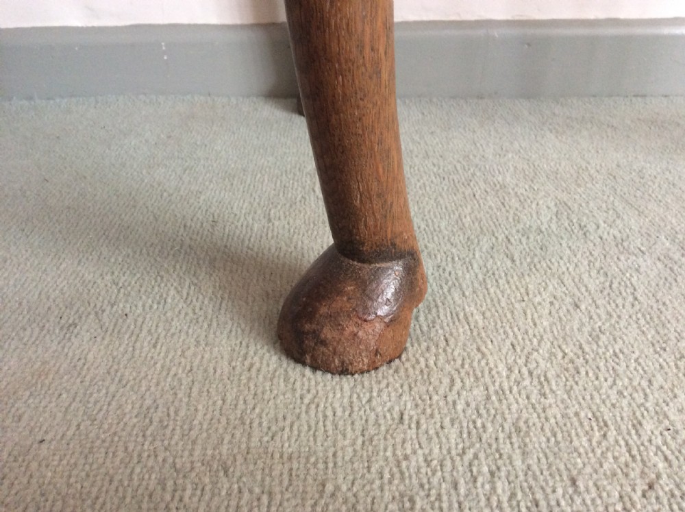 An 18thC oak hoof foot lowboy View V