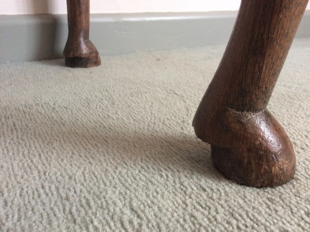 An 18thC oak hoof foot lowboy View XII