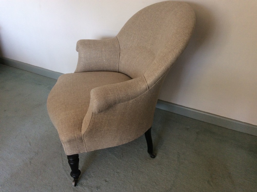 A 19thC French upholstered armchair View V
