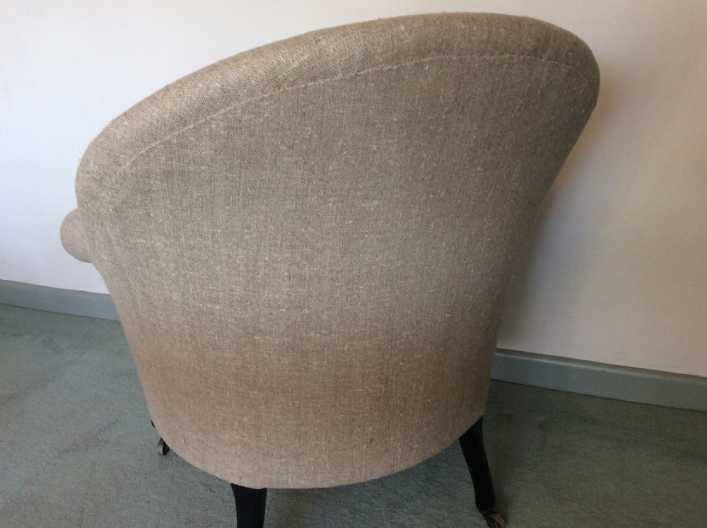 A 19thC French upholstered armchair View VIII