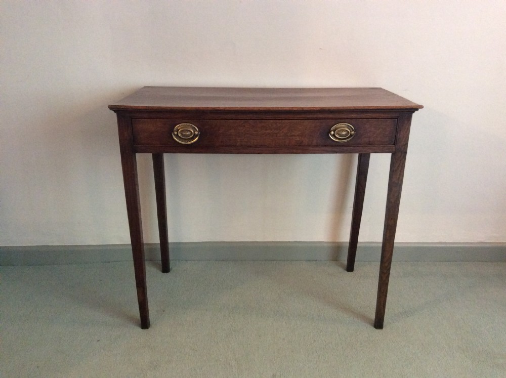 A Georgian oak side table