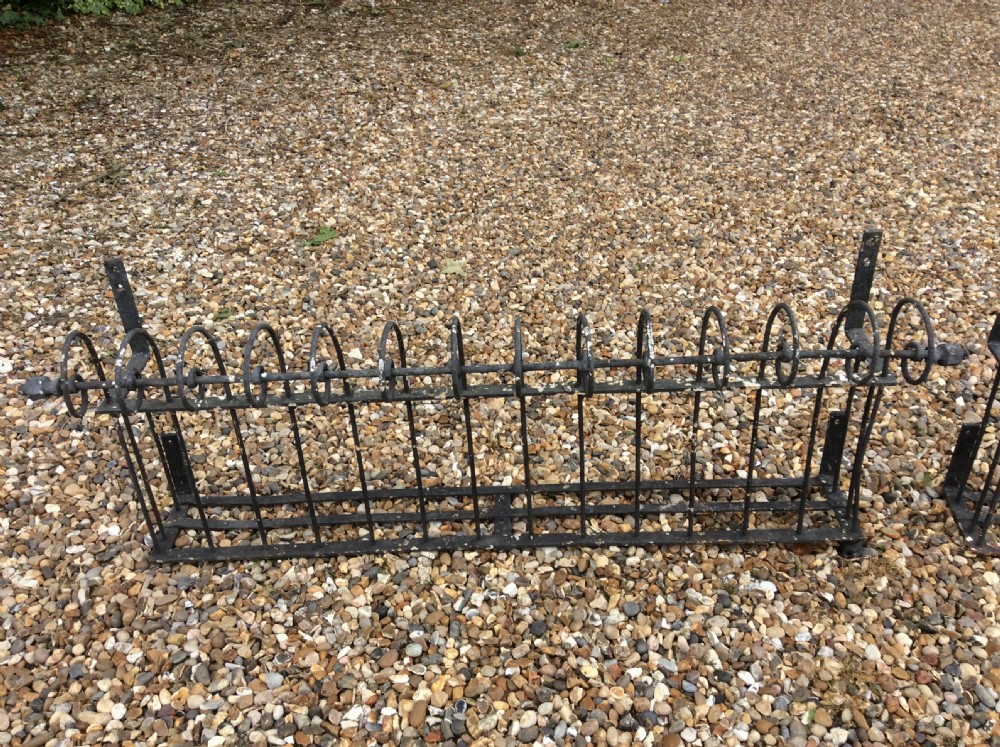 A pair of 19thC iron balcony window box railings View II