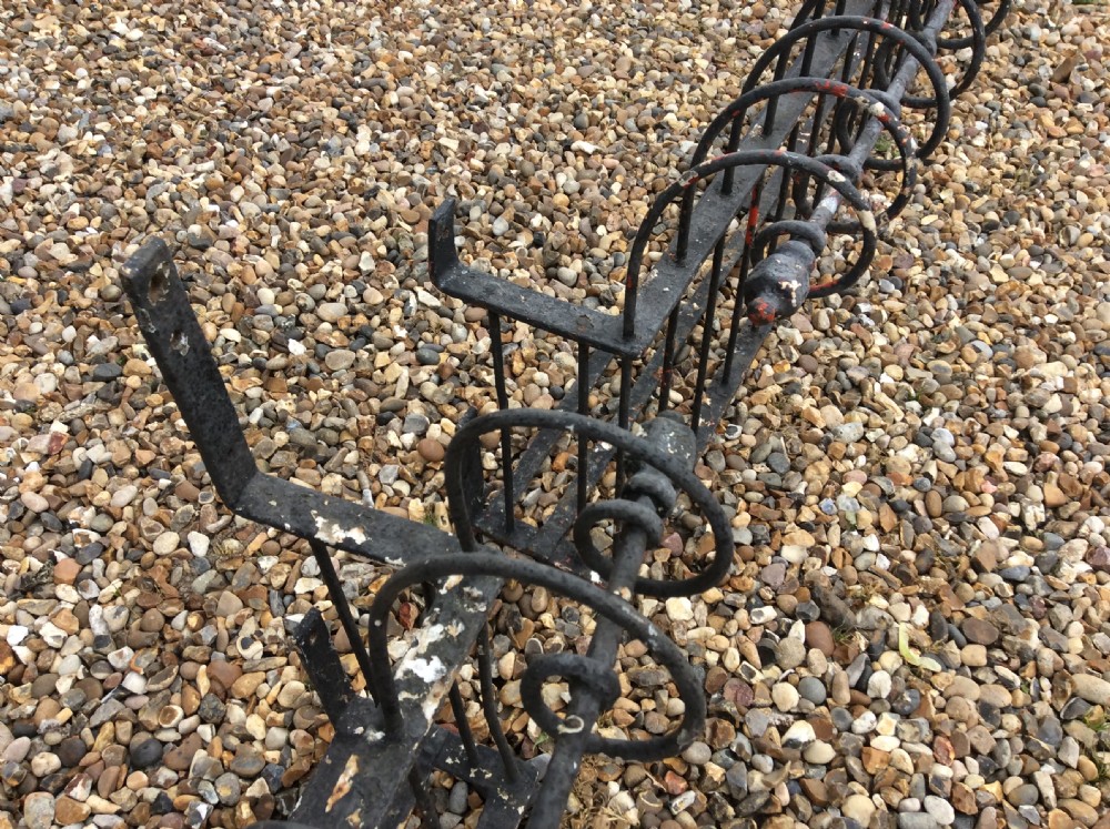 A pair of 19thC iron balcony window box railings View VI