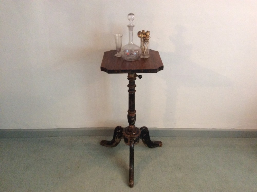 An Italian painted adjustable pedestal tripod table View V
