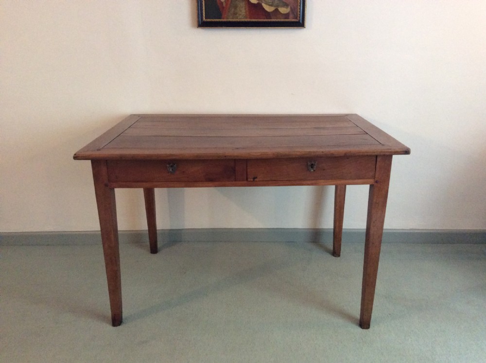 A 19thC French cherry writing table