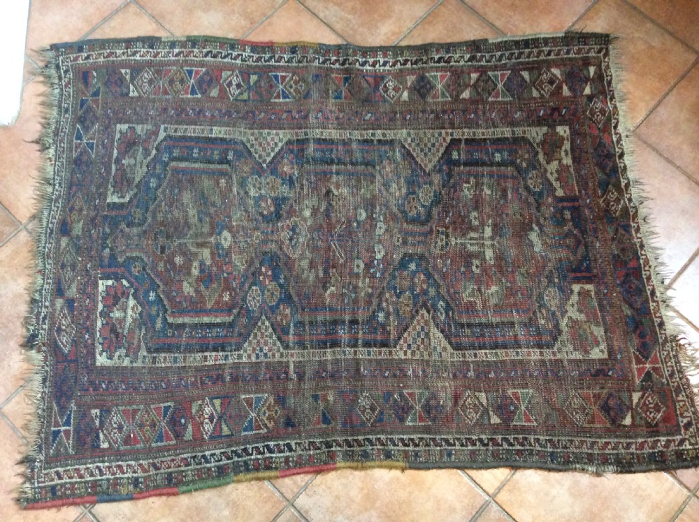 A small antique hall rug