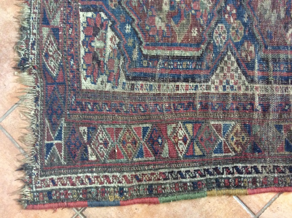 A small antique hall rug View II