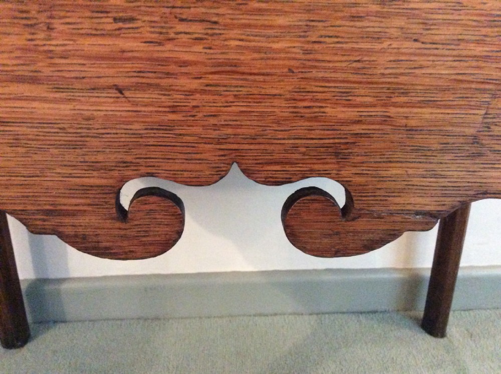 A Georgian oak lowboy View VII