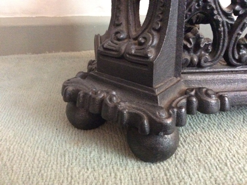 A large ornate Victorian cast iron fender View IV