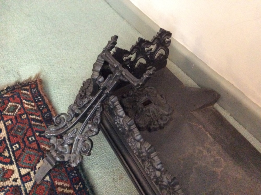 A large ornate Victorian cast iron fender View VI