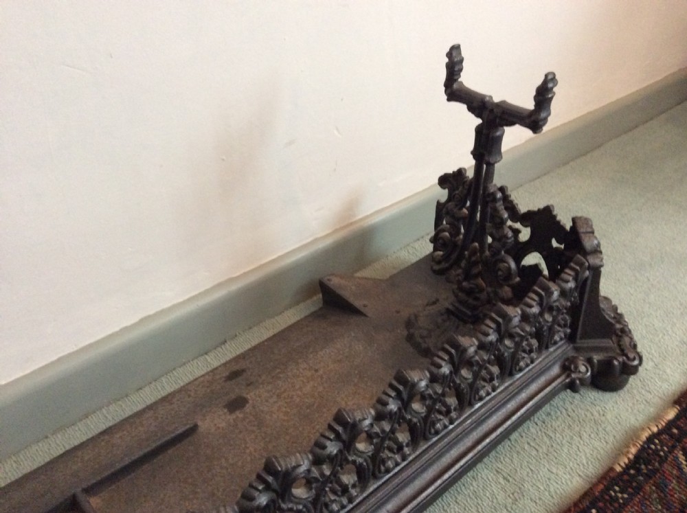 A large ornate Victorian cast iron fender View XVI