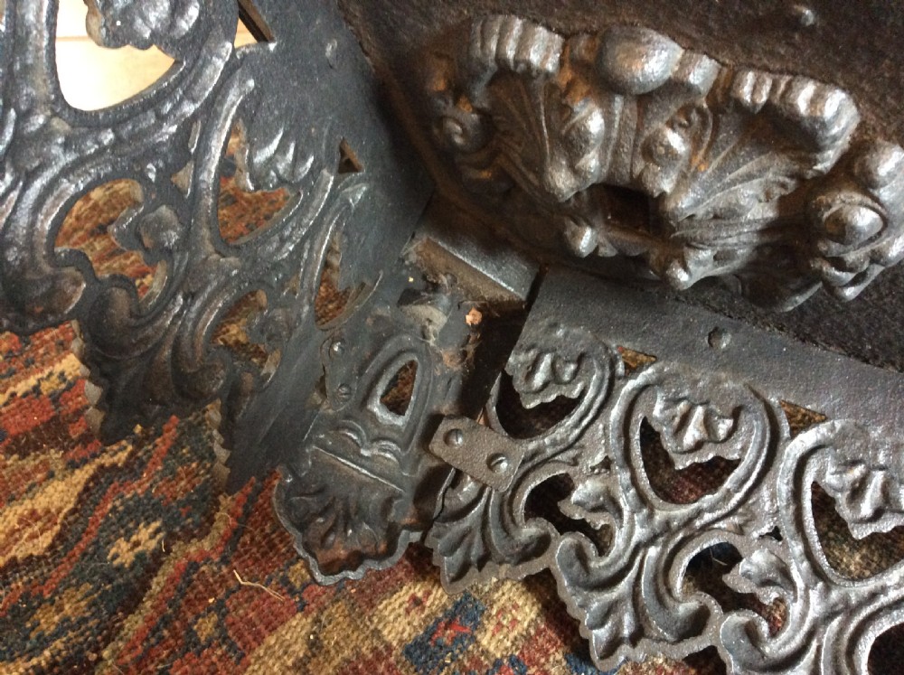 A large ornate Victorian cast iron fender View XVII