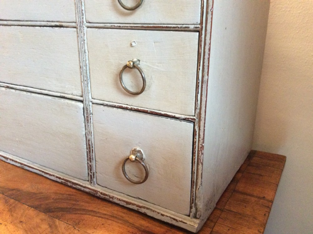 A Georgian table top bank of drawers View IV