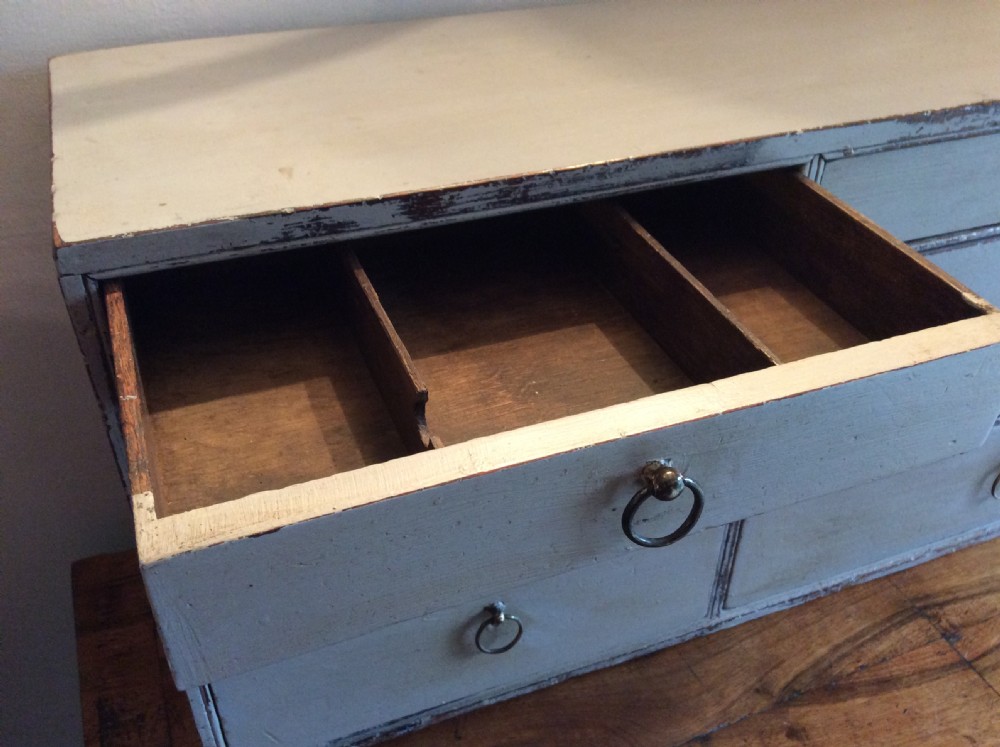 A Georgian table top bank of drawers View VI