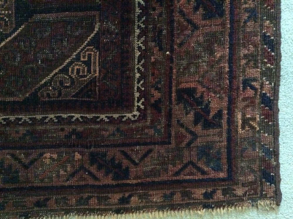 An antique rug 172 x 140 cm View II
