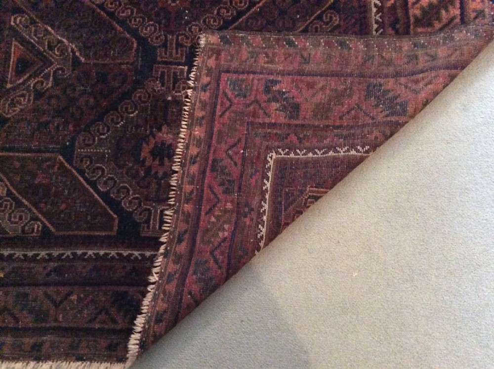 An antique rug 172 x 140 cm View III