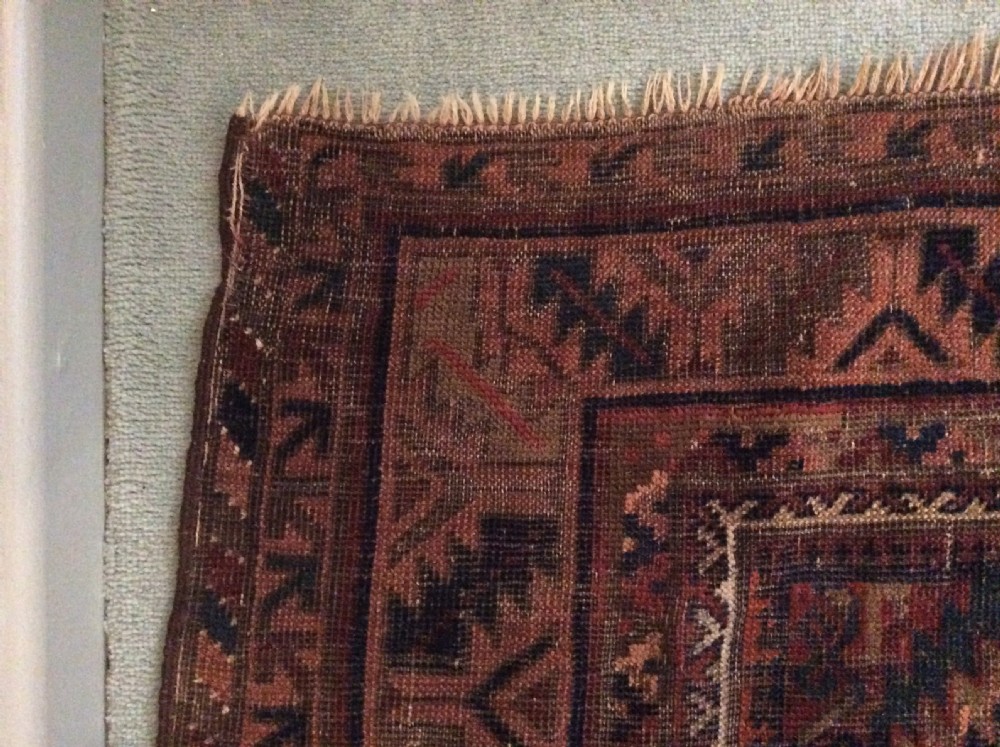 An antique rug 172 x 140 cm View V