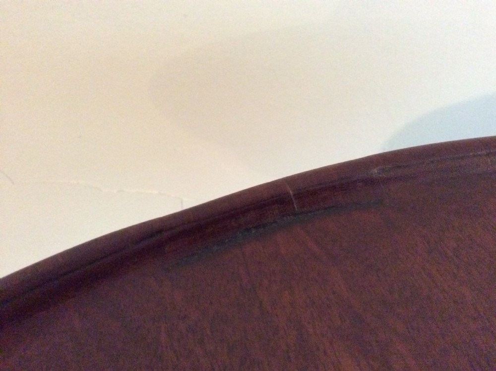 A Georgian dish top tripod wine table View V