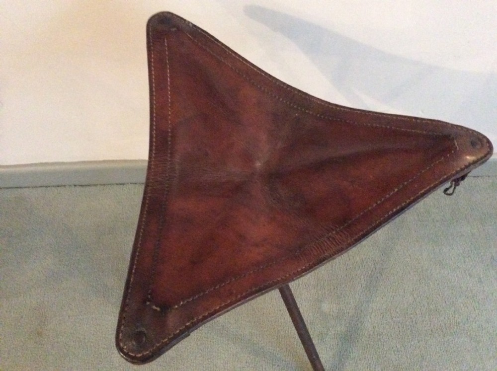 A folding leather campaign stool View II
