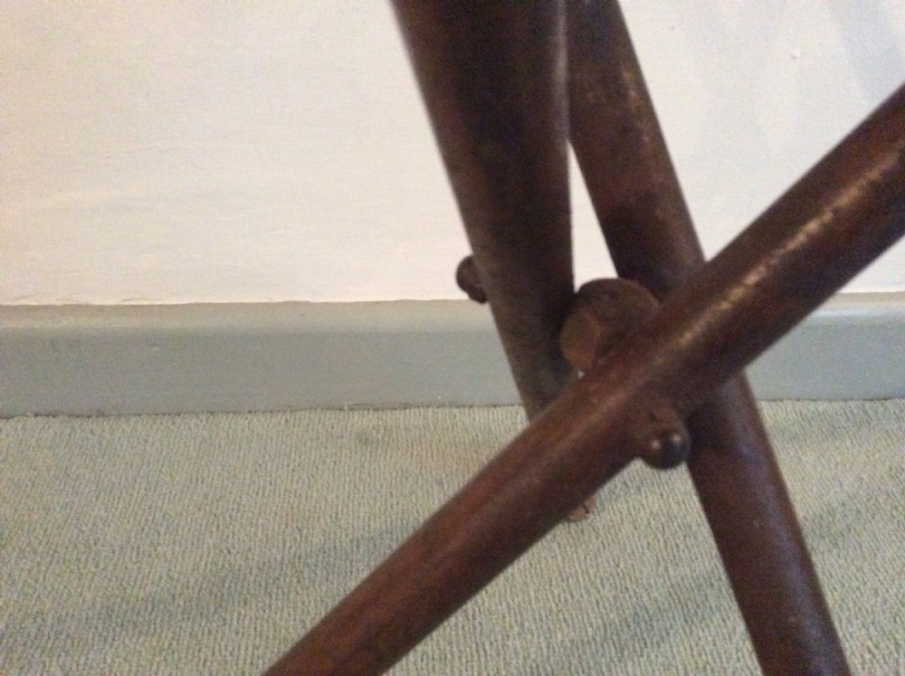 A folding leather campaign stool View III