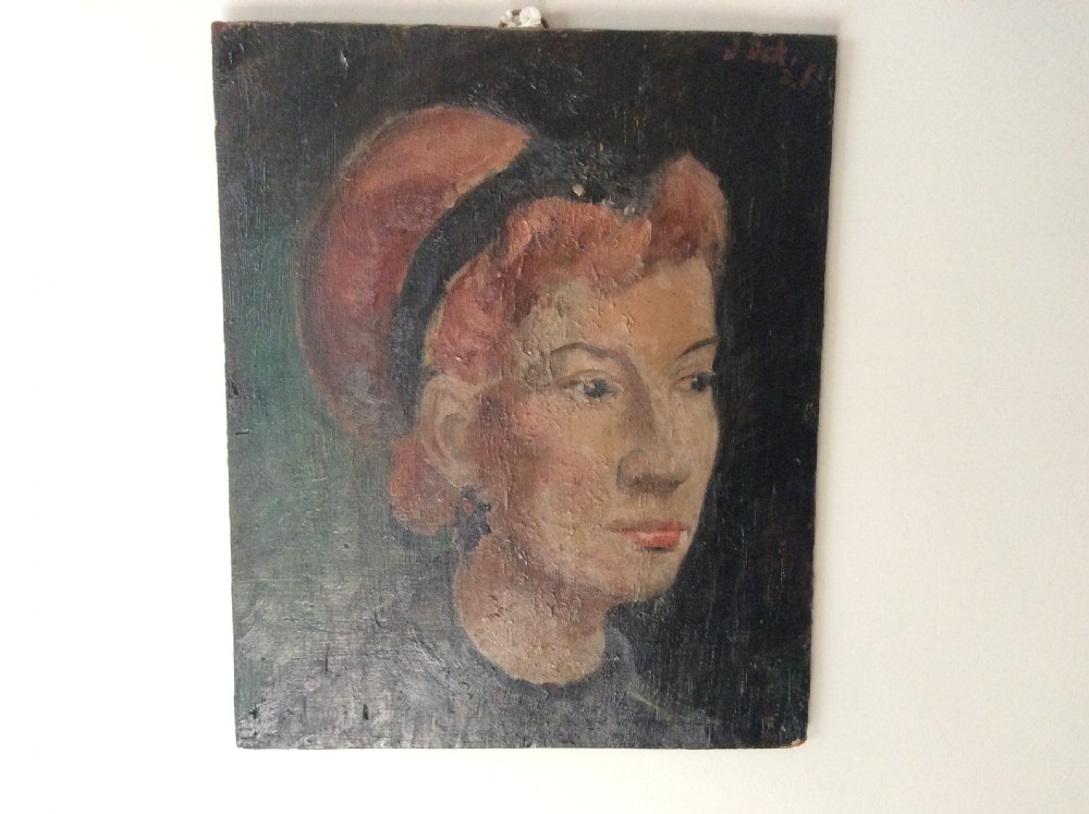 A 1920s portrait of a girl with headband