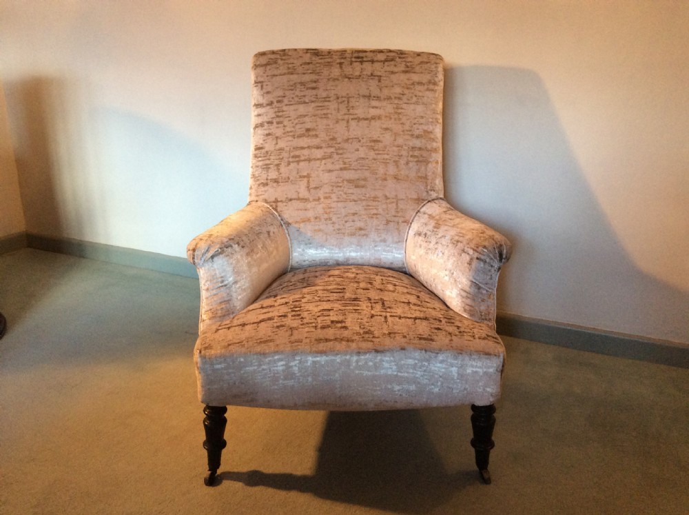A French velvet and linen covered armchair