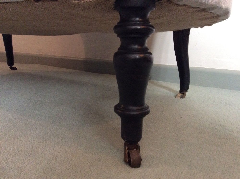 A small buttoned back French sofa View VI