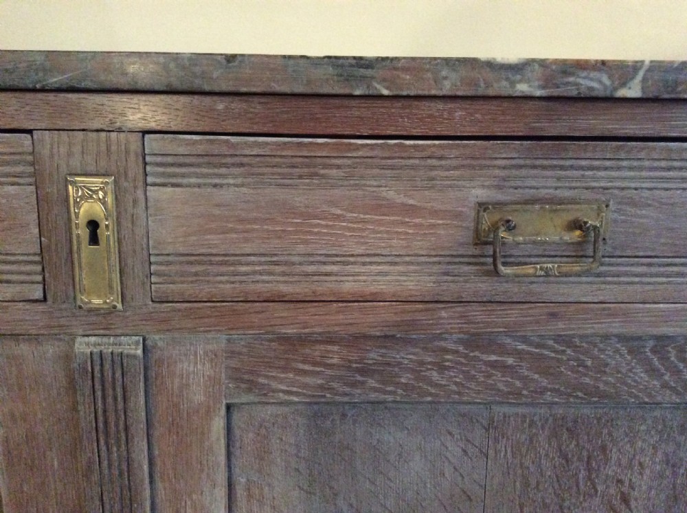 A French limed oak marble top cupboard View IV