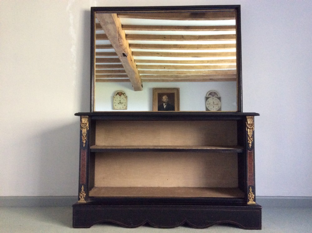 An unusual mirror backed hall console stand