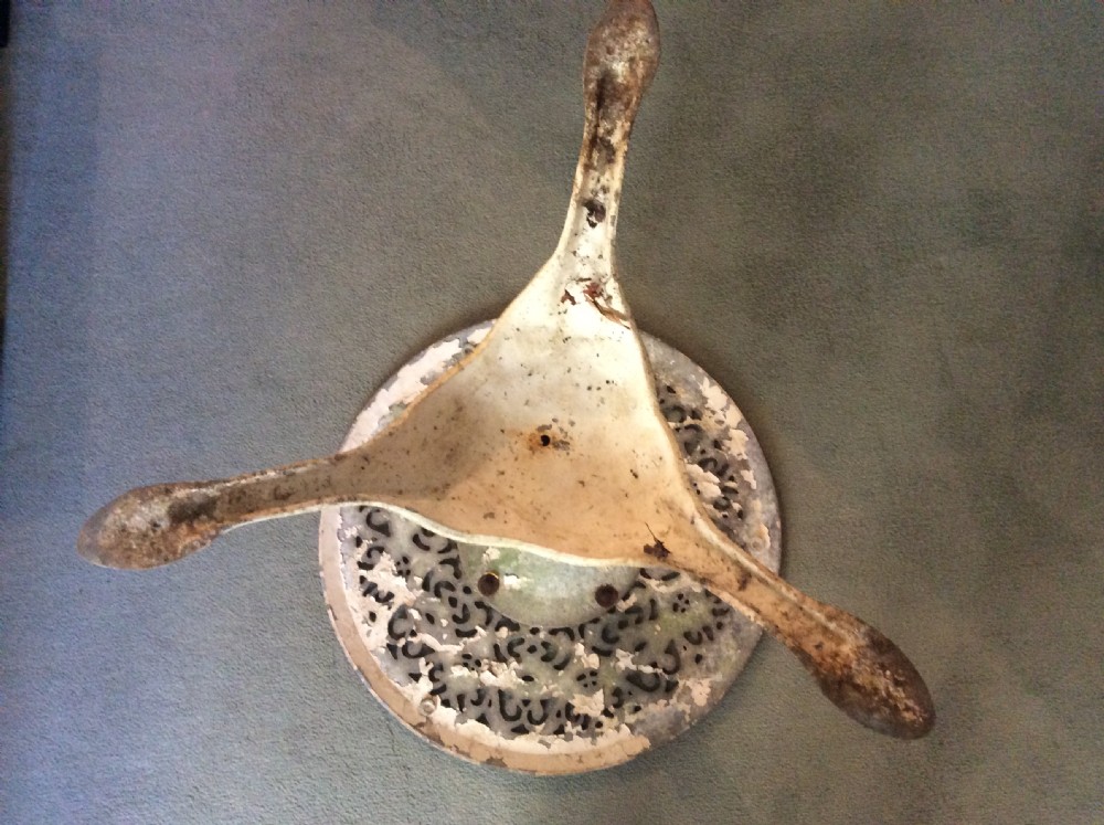 A cast metal and iron garden table View VI