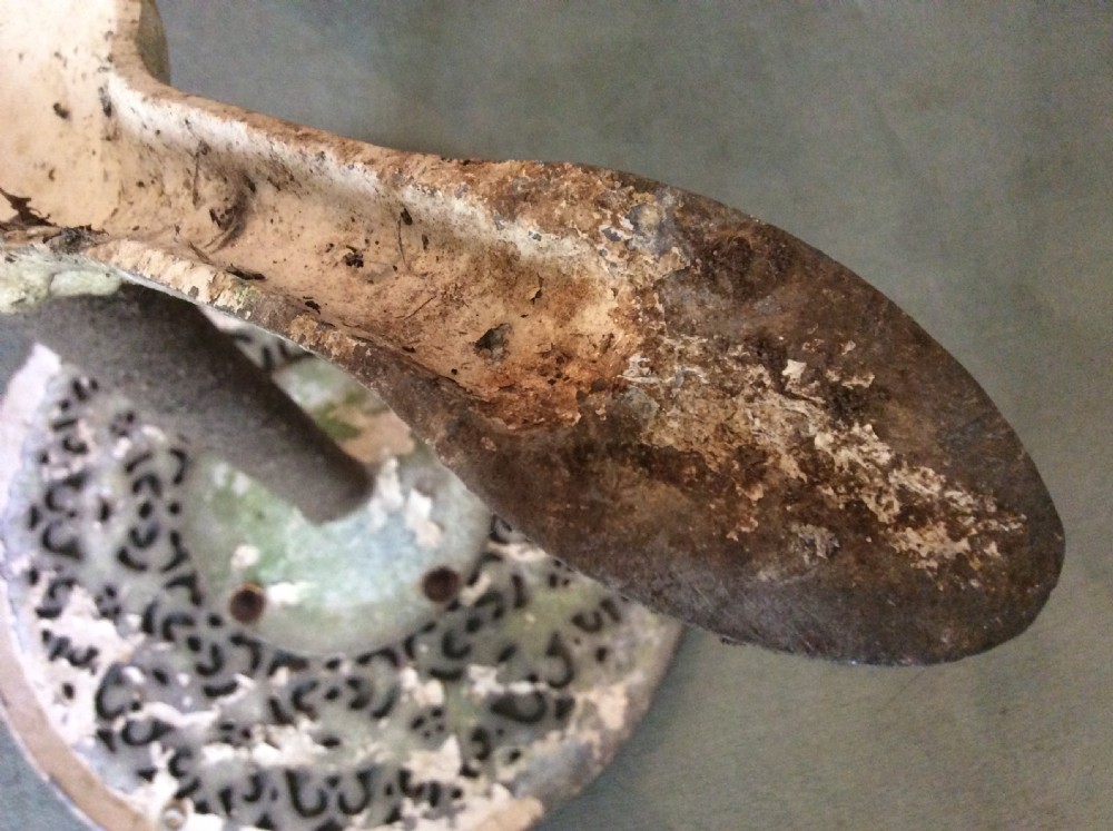 A cast metal and iron garden table View VII